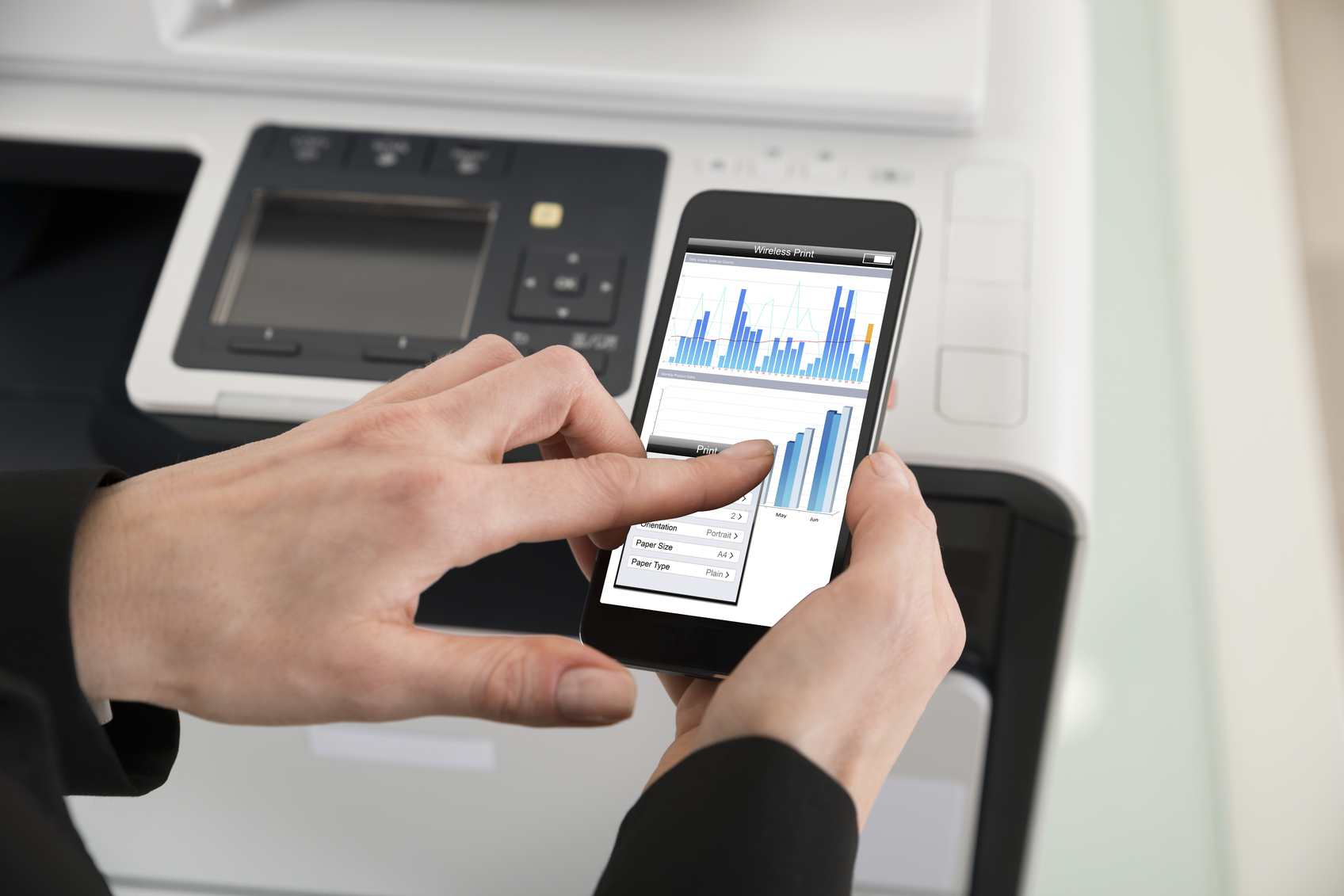 Close-up Of Businesswoman Giving Print Command On Smart Phone